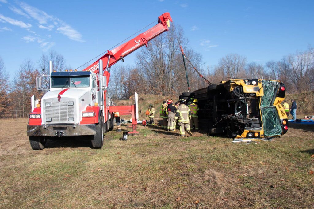 Sister Lakes firefighters working at a vehicle recovery scene